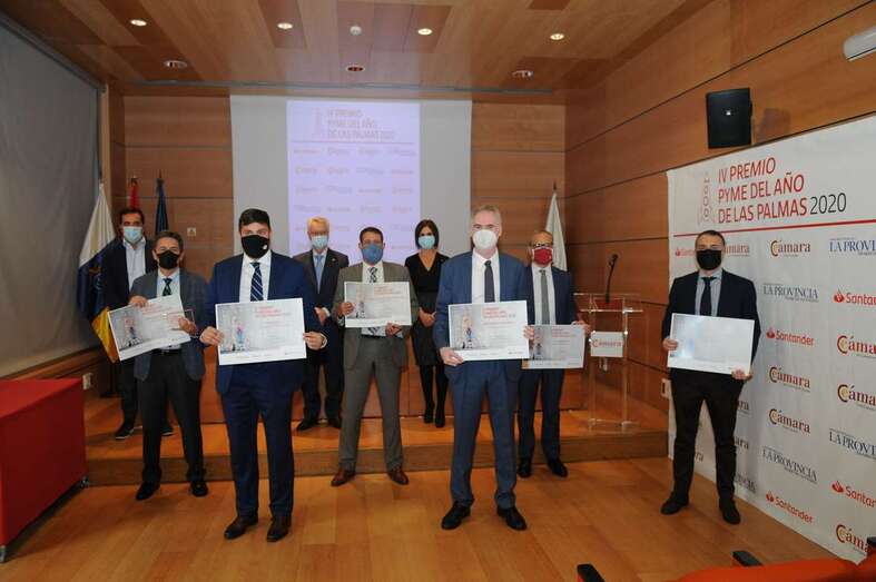 Foto de familia de los ganadores/TA: